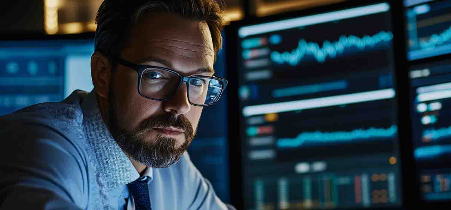 financial analyst using advanced analytics software